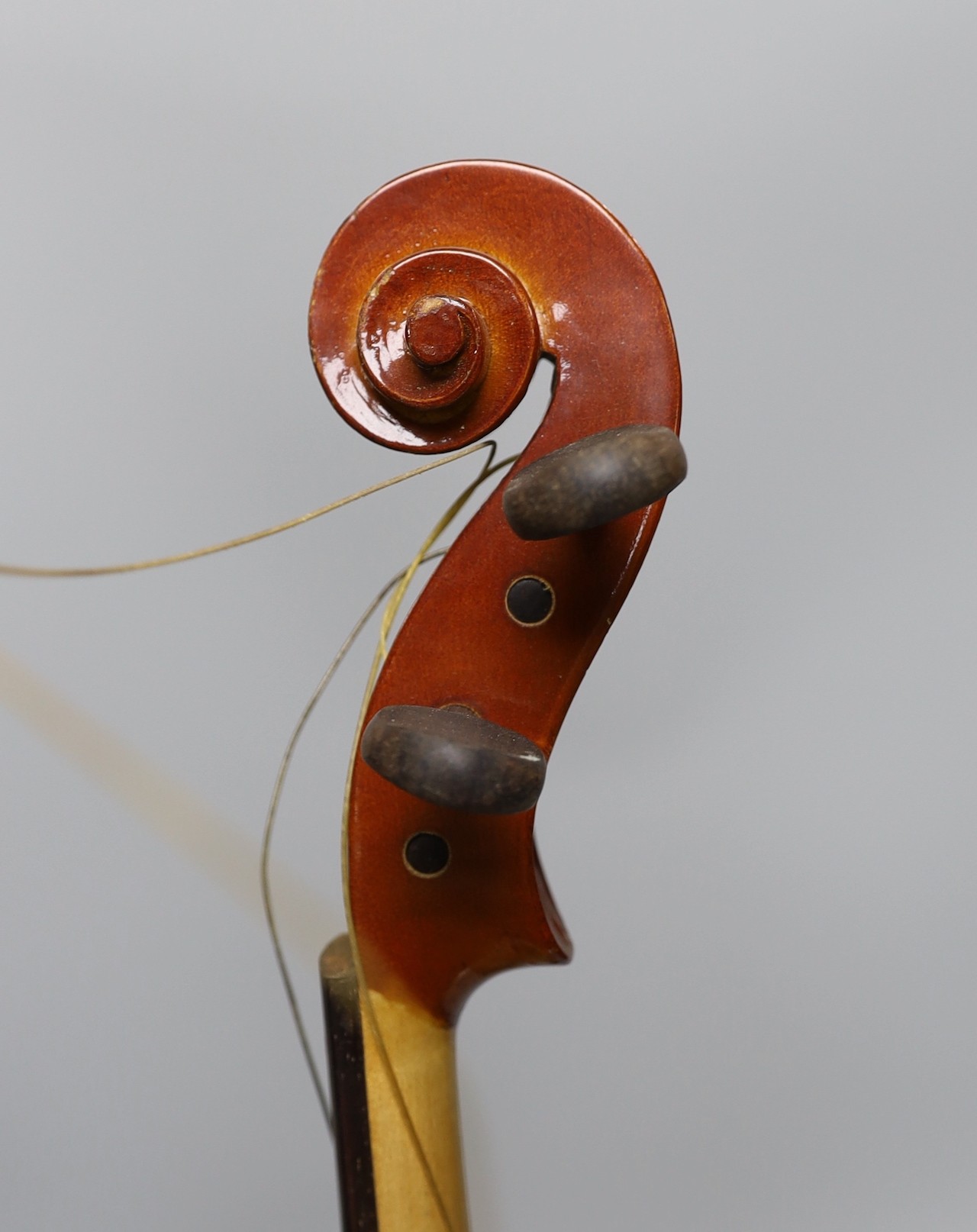 A cased viola and bow, viola back measures, 40.5cm